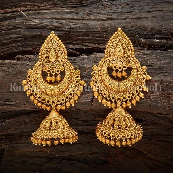 Designer antique jhumka earrings plated with gold polish and made .