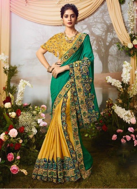 yellow colour gorgeous wedding and party wear silk heavy work .