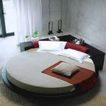 Round shaped king size bed helping in decorating your bedroom .