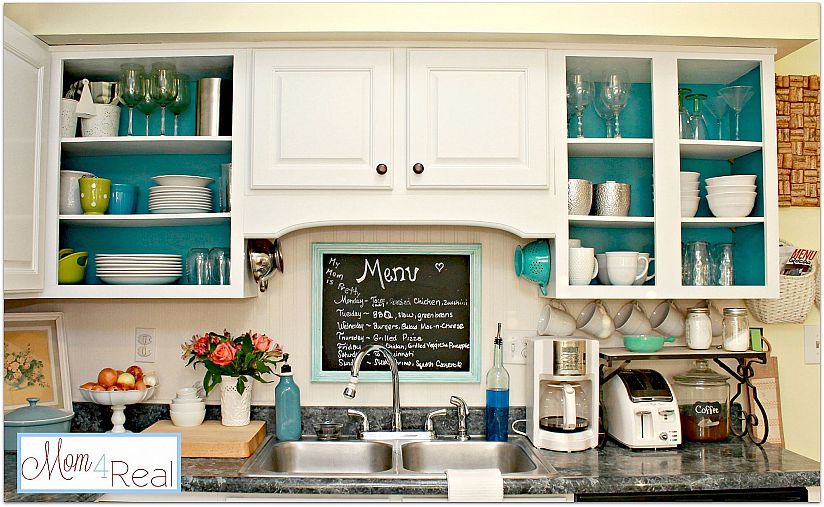 Open Kitchen Cabinets with Aqua, White, Lime Green, and Silver .