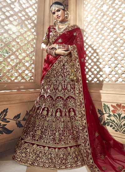 Dark maroon velvet embroidered heavy designer Indian wedding .