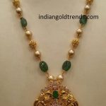 Latest Indian Gold and Diamond Jewellery Designs: emerald Pearl .