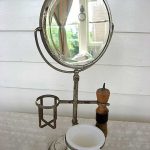 A vintage 1920s 15 inch high double sided shaving mirror and stand .