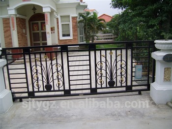 Popular high garde ornamental wrought iron sliding gate design .