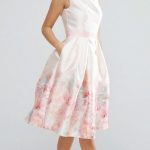 Pale pink dress with pastel floral hem detail. Beautiful dress for .