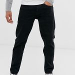 ASOS DESIGN stretch tapered jeans in black | AS
