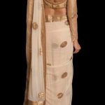 Pretty white and gold saree or sari with blouse. #IndianFashion .