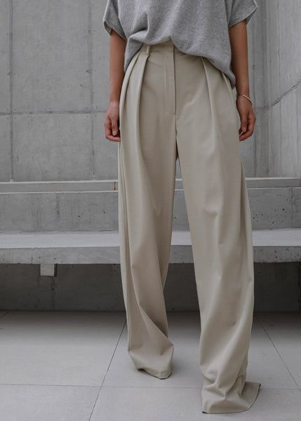 Understated Sophistication: Elevating Your Look with Beige Trousers