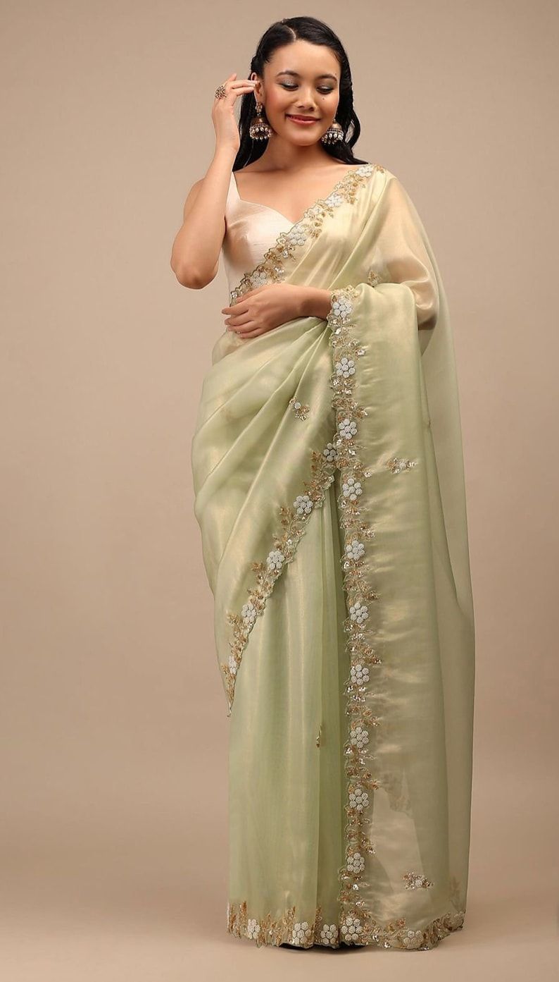 Graceful Drapes: Elevating Style with Organza Sarees