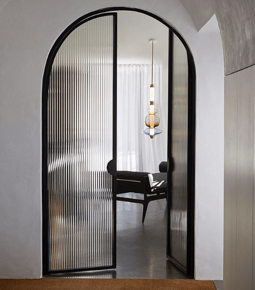 Glass Door Designs: Bringing Light and Elegance into Your Space