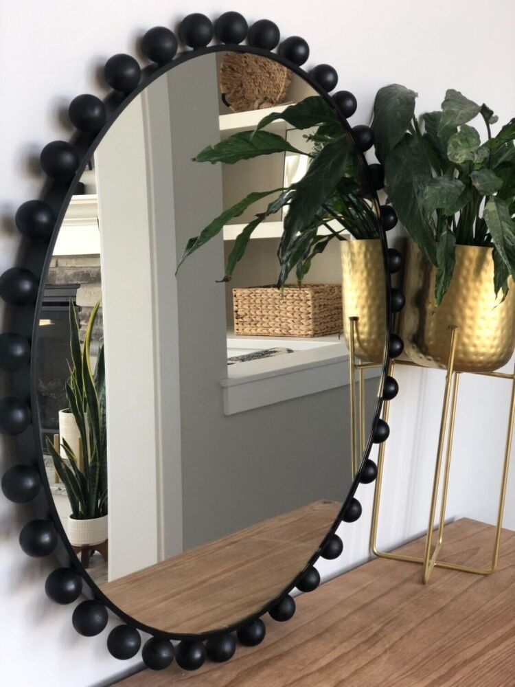 Round Mirror Designs: Adding Elegance and Depth to Your Space