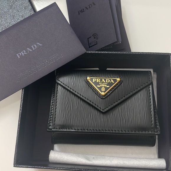 Luxury in Leather: Elevate Your Look with Prada Wallets