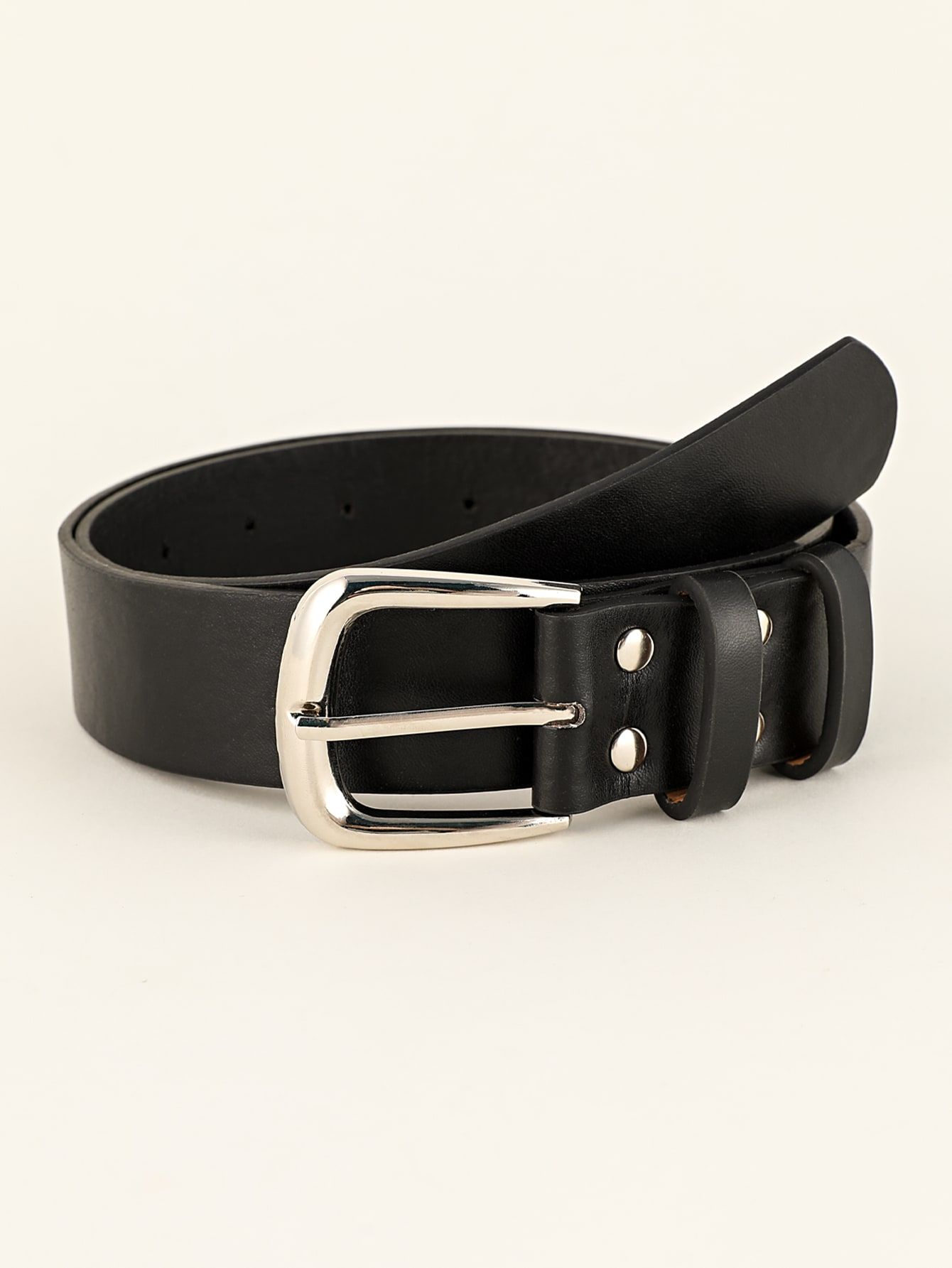 Metallic Accents: Add Edge with Stylish Metal Belts