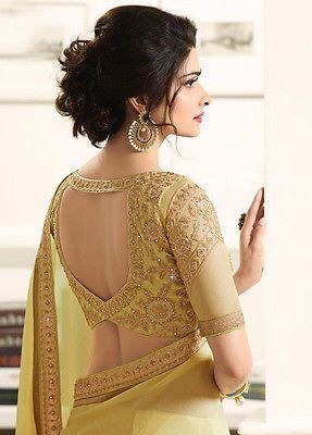 Shimmering Sophistication: Golden Blouse Designs for Festive Flair