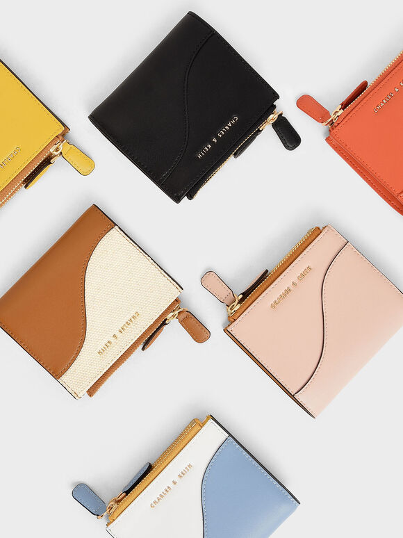 Wallets for Women: Functional Accessories with Fashion Flair