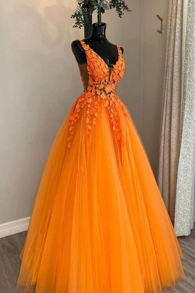 Radiate Elegance in an Orange Dress: A Vibrant Choice