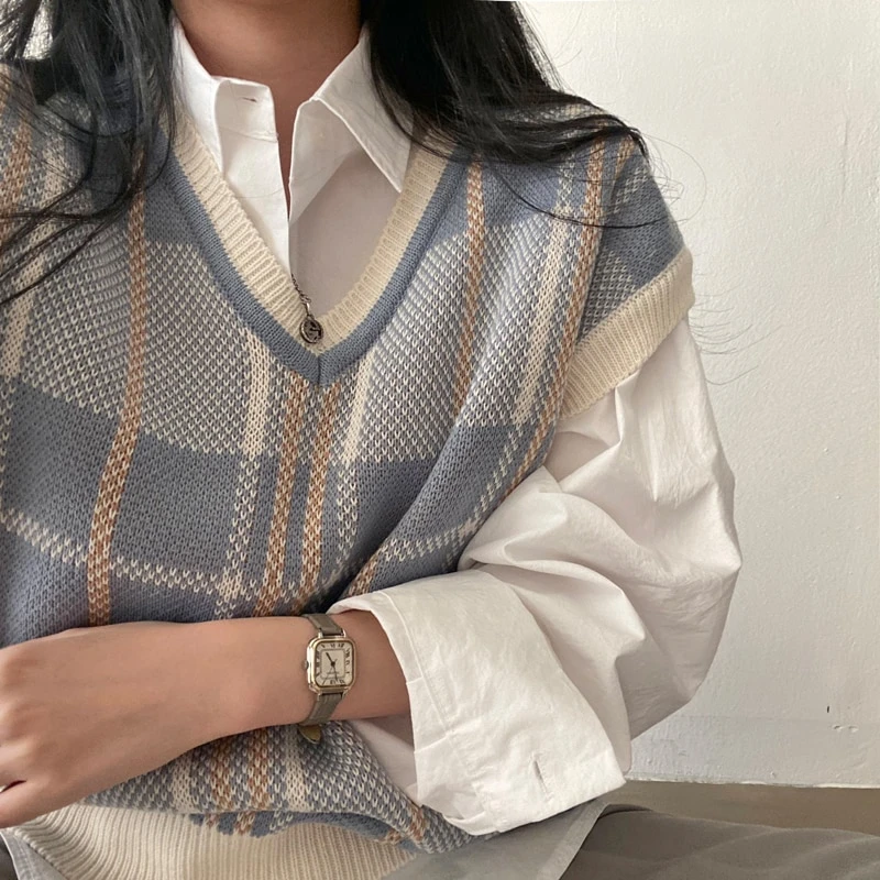 Sleek Sophistication: Sleeveless Vests for Layered Looks