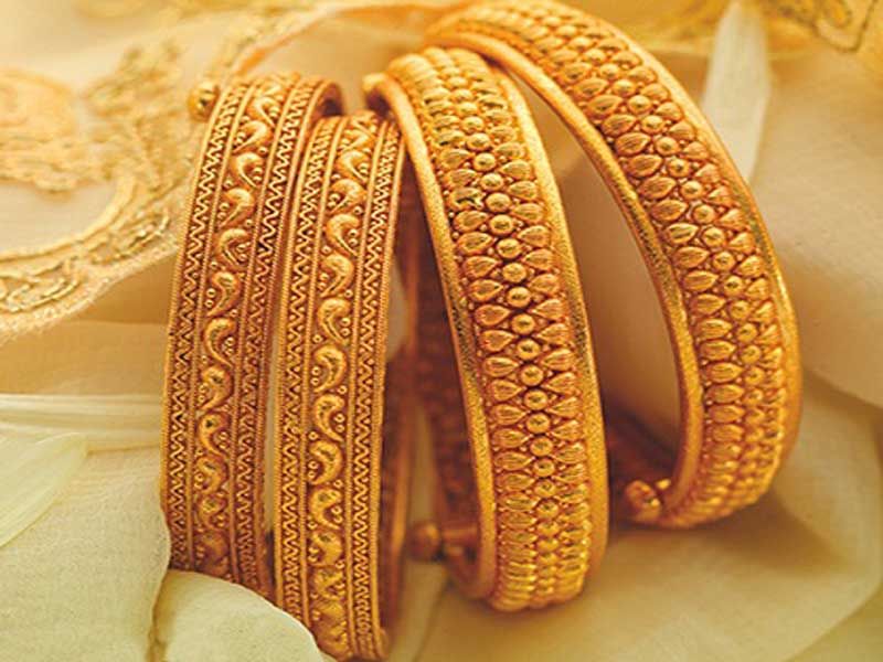 Elegance in Gold: 8 Gram Gold Bangles That Define Luxury