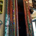 Beaded curtain.diy... Mardi gras beads curtain rod...time, still .