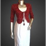 The off white Hakkoba top worn with maroon Ikat coat with a quirky .