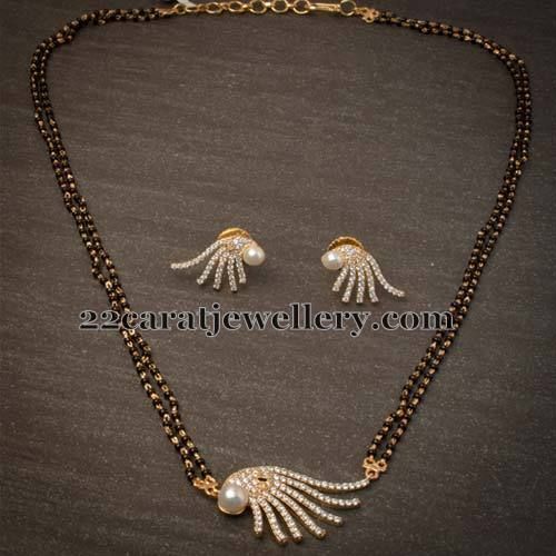 Fancy Simple Mangalsutra | Black beaded jewelry, Diamond jewelry .