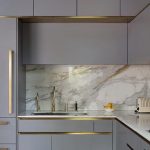 Gold tap in grey metro&urbo Roundhouse kitchen .
