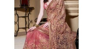 Exclusive latest designer Party Wear Net Bridal Work Saree Peach .