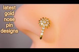 Latest gold nose pin designs for girls/wedding nose pin pictures .