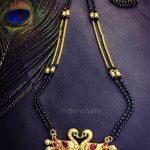Peacock pair pearl mangalsutra (With images) | Gold mangalsutra .