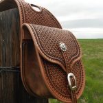 Custom Hamdmade Stamped Leather Saddle Bags. For sale on etsy by .