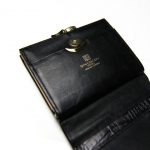 An authentic vintage Givenchy wallet, emulating what Givenchy does .