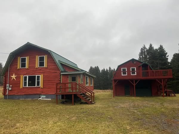 Spacious 5-Bedroom Log Cabin on 156.82 Acres in Caribou, Maine