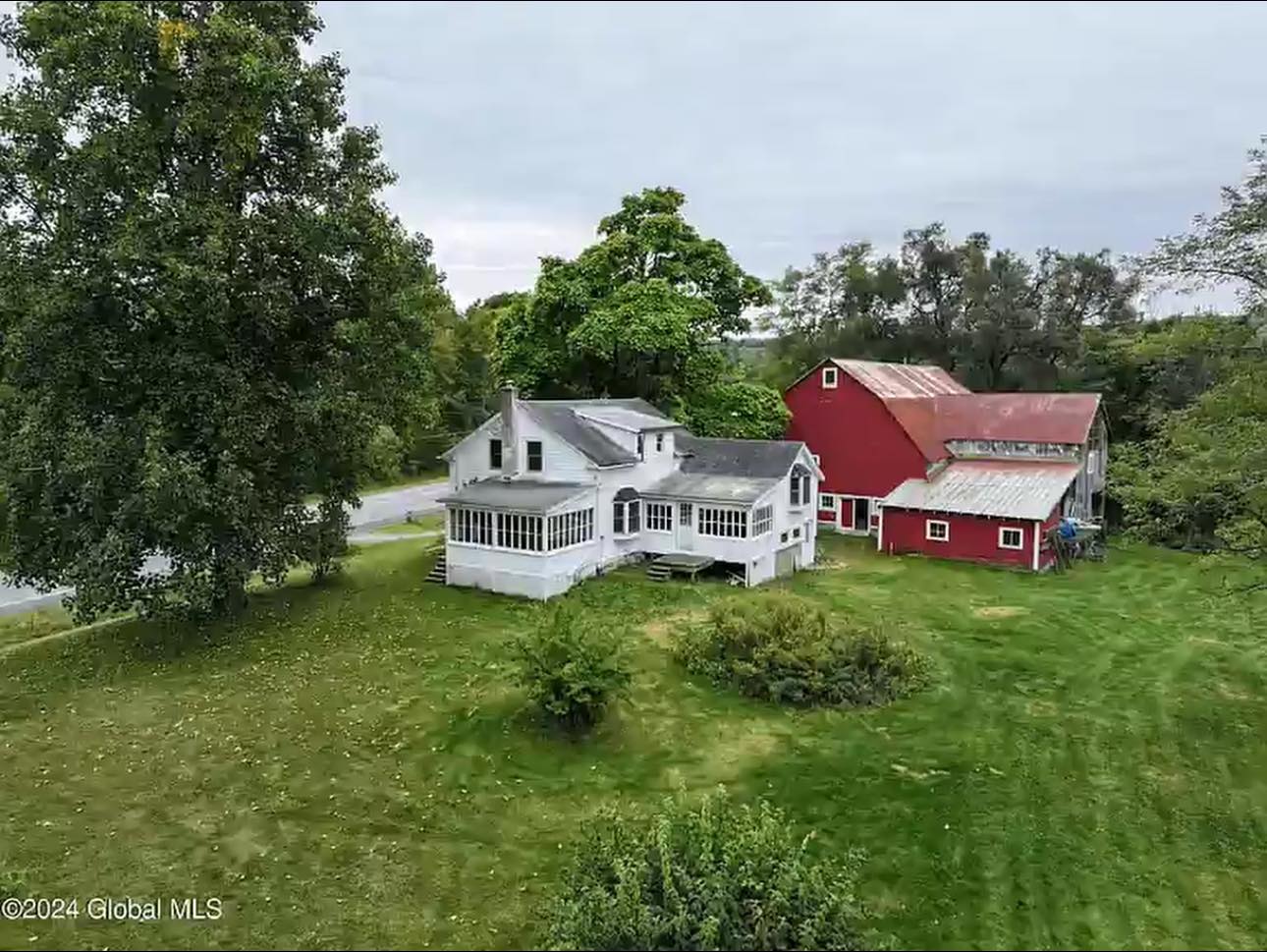 Stunning 401.5-Acre Estate with 1800s Farmhouse and Breathtaking Mountain Views – Exceptional Investment Opportunity
