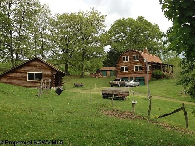 Spacious 4-Bedroom Log Home with 24.75 Acres in Morgantown, West Virginia