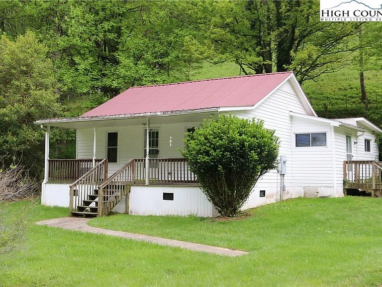 Charming Country Cottage Walking Distance to Trout-Stocked North Fork New River – $84,900