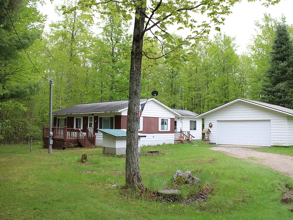 Serene 10-Acre Getaway Featuring 2-Bedroom House and Detached Garage – $135,000