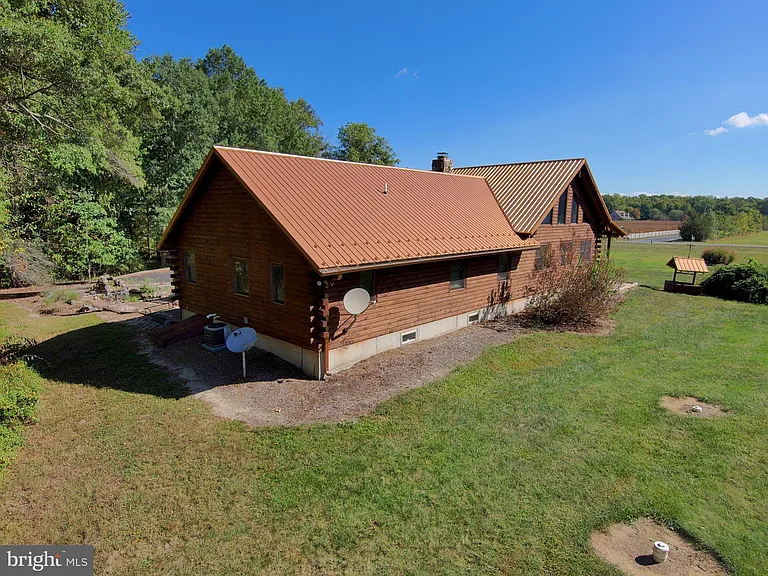 $40K Price Drop – Stunning Custom Log Home on 26 Private Acres
