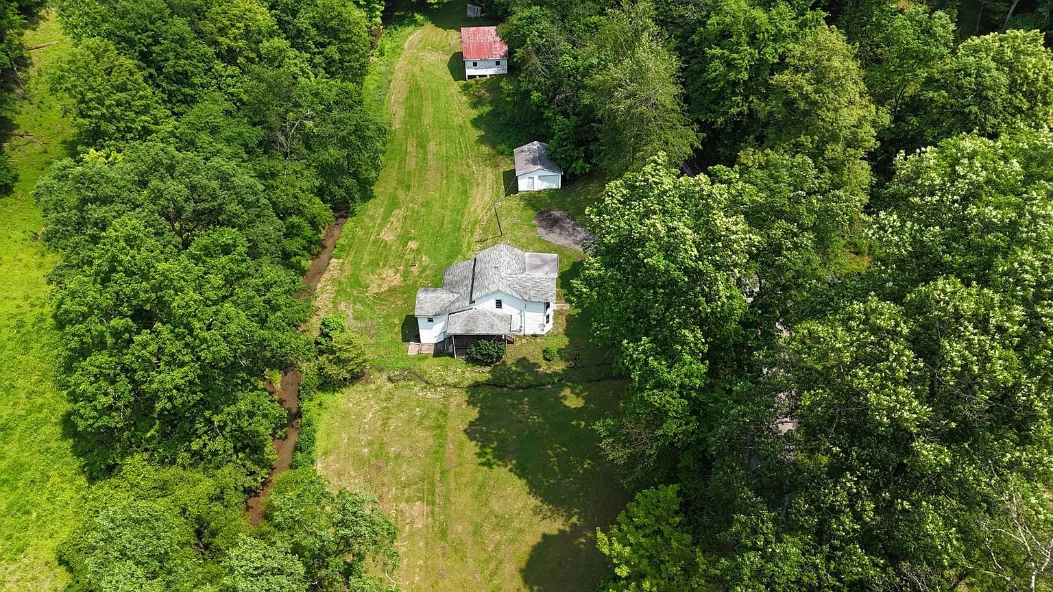 Spacious 4-Bed Home with Land – Just $49K