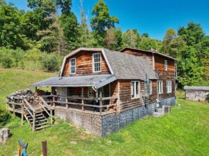 Log Home Retreat on 10 Acres in Pennsboro, WV