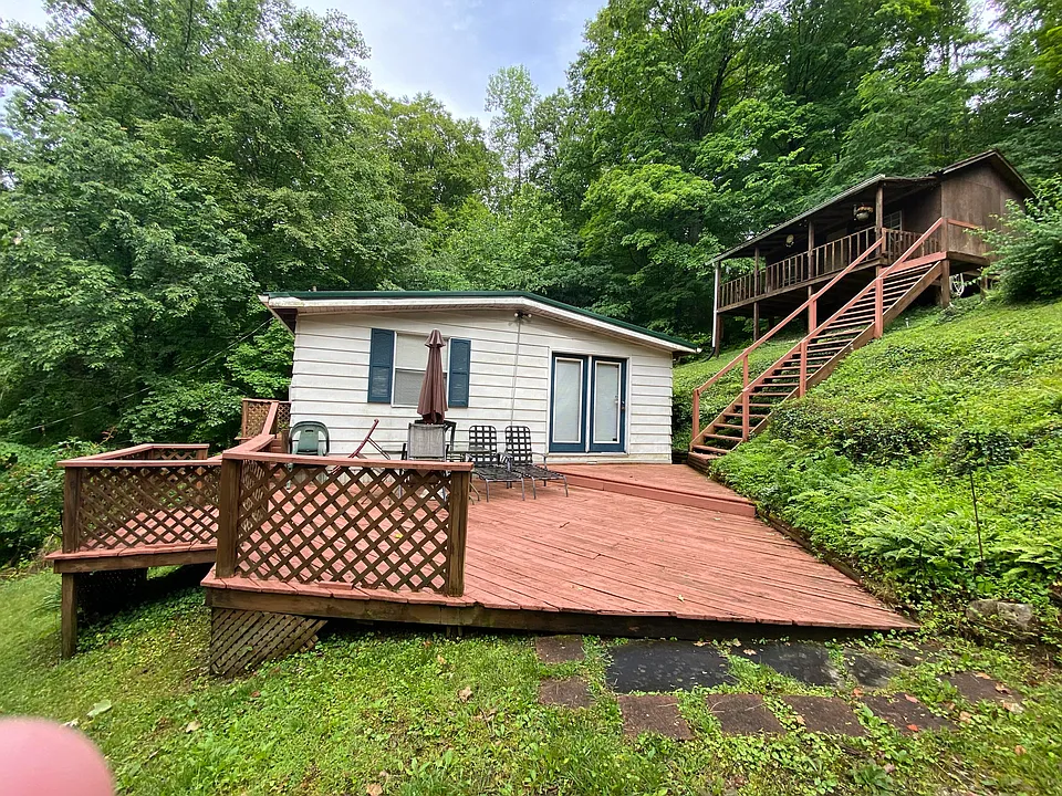Secluded 2-Bed, 1-Bath Doublewide with Bonus Cabin – $55,000
