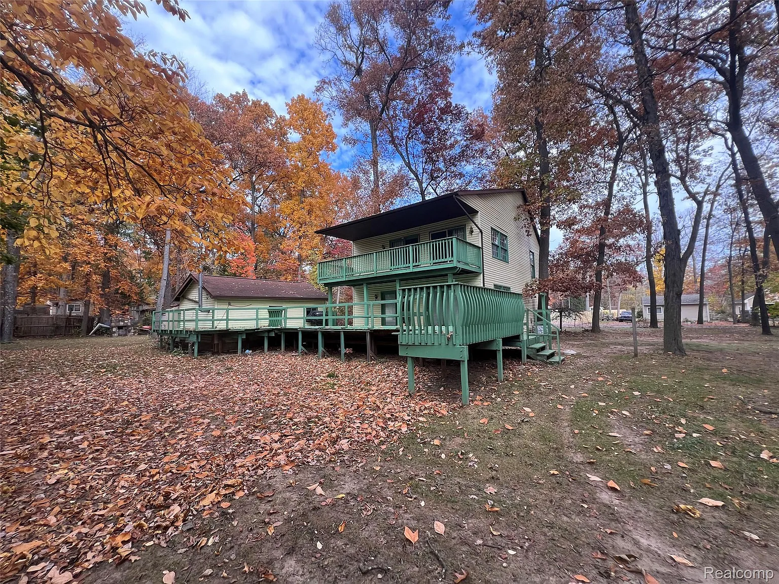 Charming Colonial Retreat with Golf Course Views & Lake Access – No HOA!