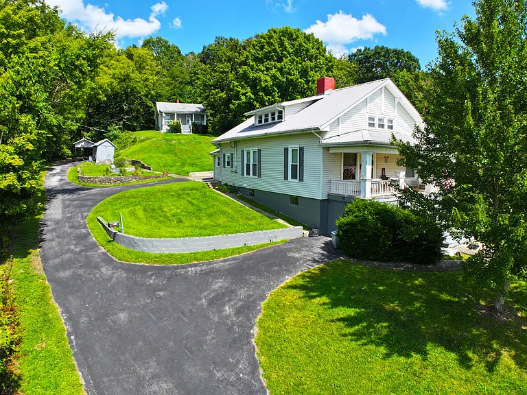 Fantastic Kentucky Deal! Over 9 Acres, 2 Homes, Plus an Extra Building Lot Facing Broadway – Only $259,000
