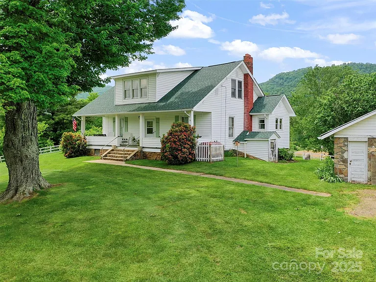 Beautiful Farmhouse with 4.7 Acres — No Restrictions