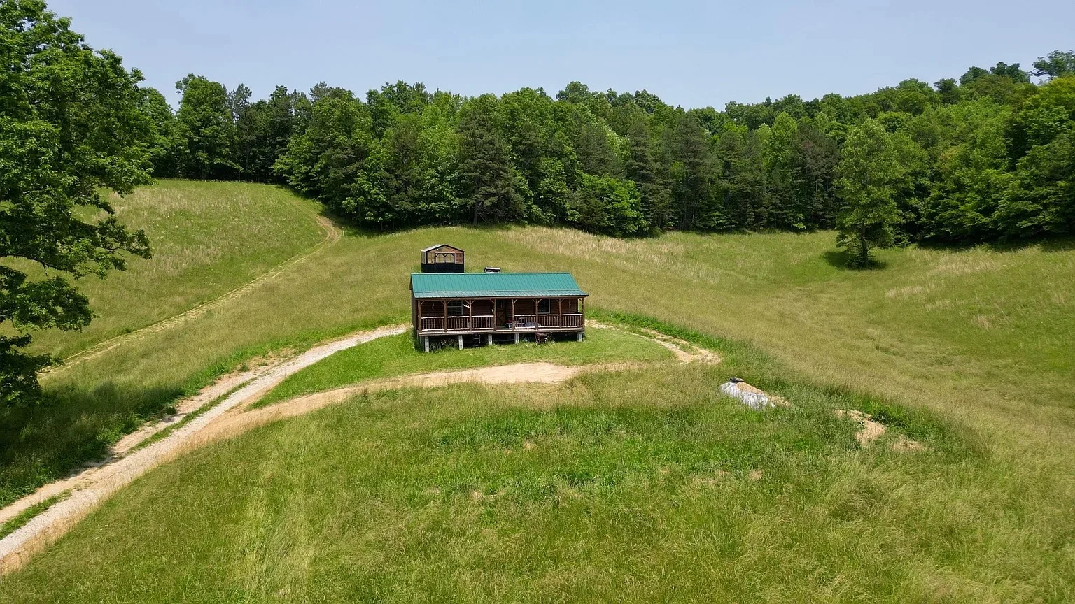 Peaceful Countryside Property with Unfinished Cabin in Tyner, Kentucky