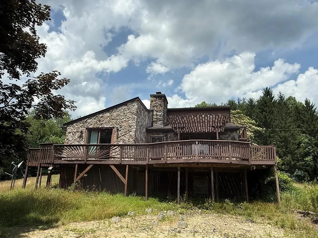 4-Bedroom Hilltop Property on Almost 50 Acres in Scarbro, WV