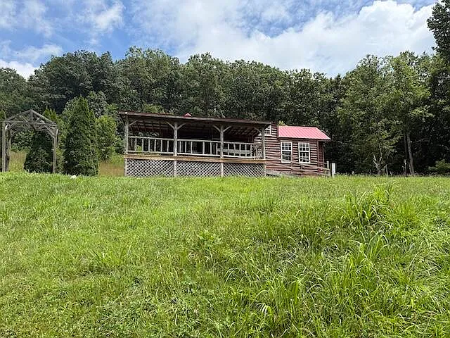 Tiny House Living on 6+ Acres with Barn – 1 Bed, 1 Bath for $70,000