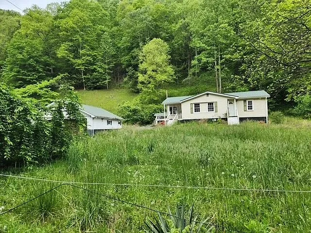 Charming Country Home on 6 Acres with Basement – Phelps, KY