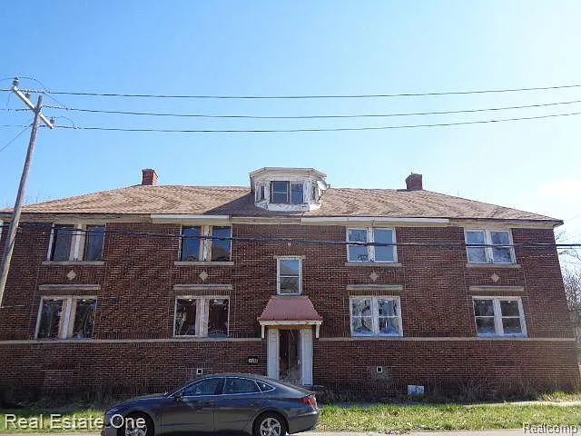 Cash-Only Quadplex with Garage