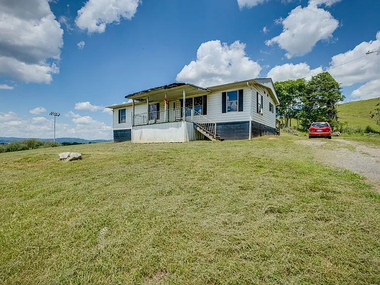 Fixer-Upper with Huge Potential on Half Acre Near Schools & Park