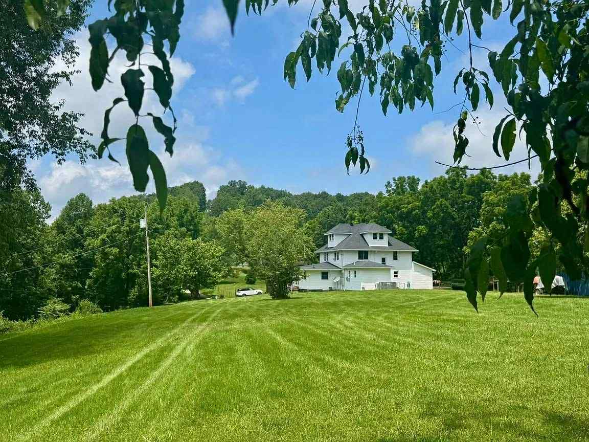 Classic Farmhouse Sitting on 101 Acres